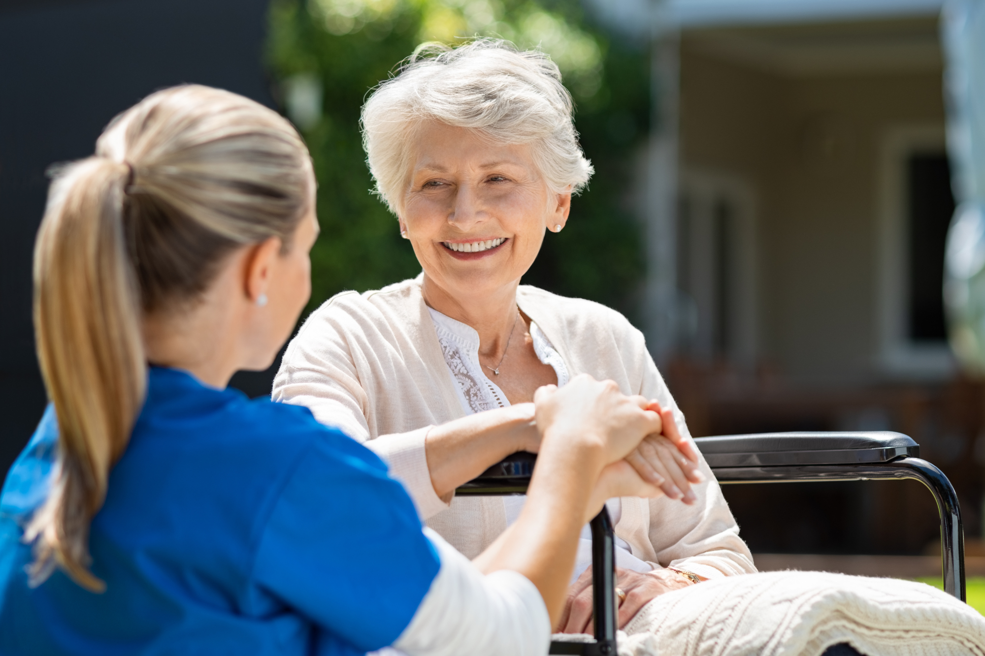 A senior woman smiling while receiving continuing care in Milton, WI, highlighting the personal touch of this care service.