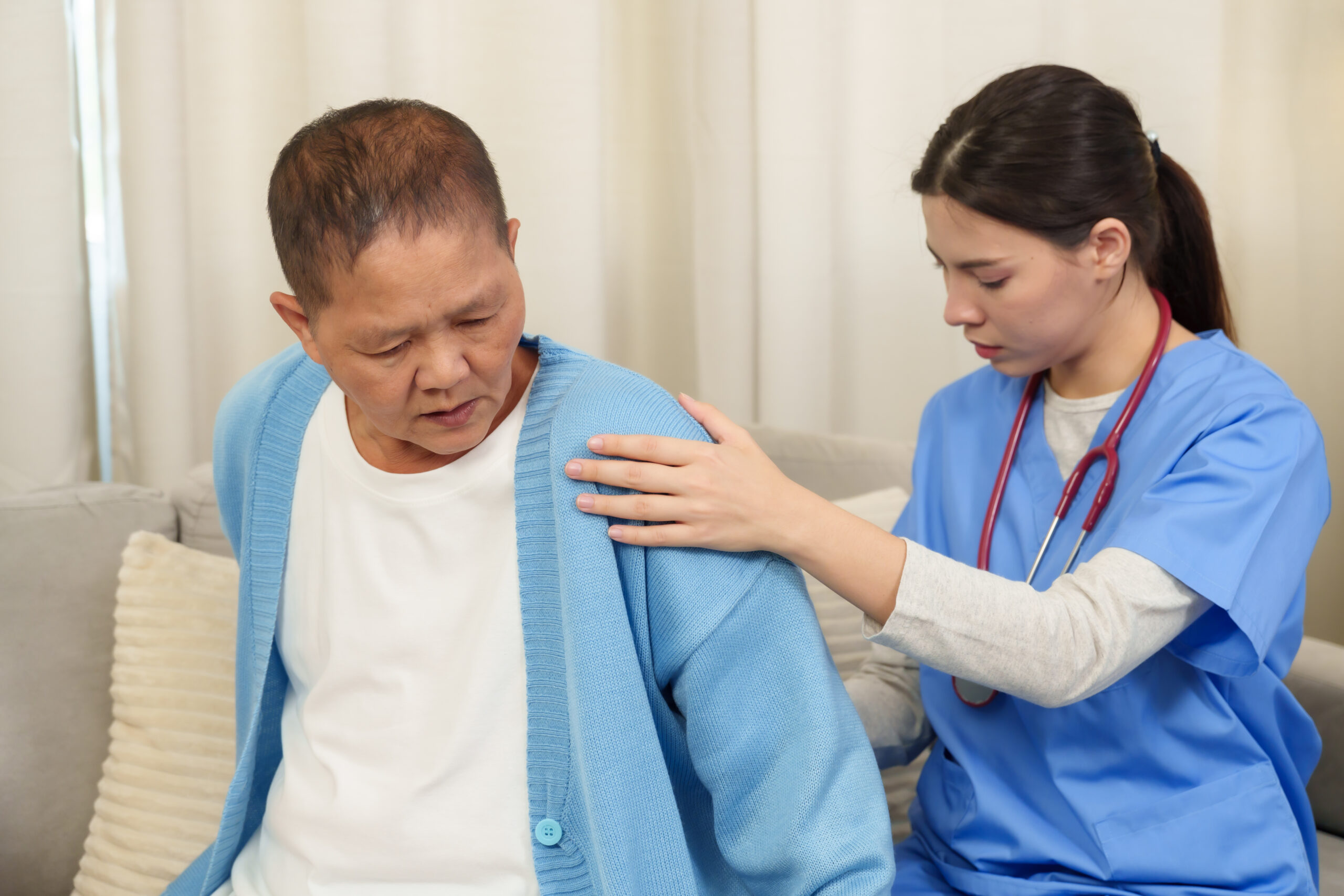 Physiotherapist carefully examines elderly patient’s shoulder, offering gentle assistance and personalized care to improve mobility and reduce discomfort. Physiotherapist carefully examines elderly patient’s shoulder, offering gentle assistance and personalized care to improve mobility and reduce discomfort.